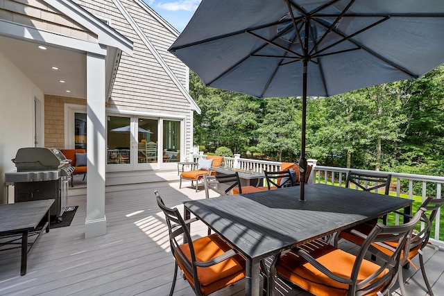 wooden terrace with grilling area