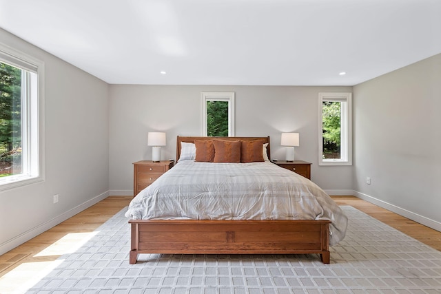 329 Waquoit Rd, Cotuit, MA 02635 - bedroom featuring multiple windows, light wood-type flooring, and recessed lighting