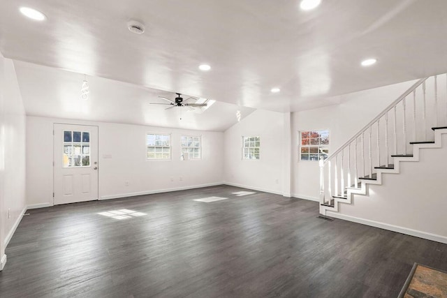 unfurnished living room with ceiling fan, dark hardwood / wood-style floors, and vaulted ceiling