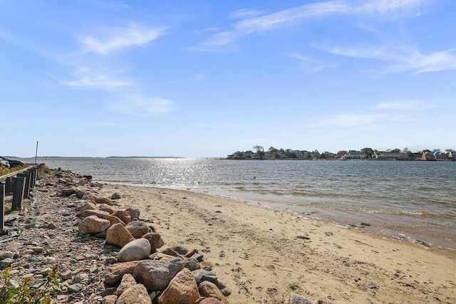 view of water feature with a beach view