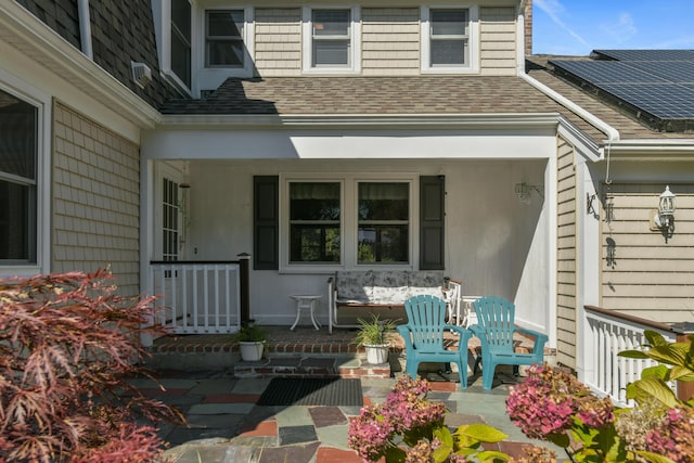 property entrance featuring a porch