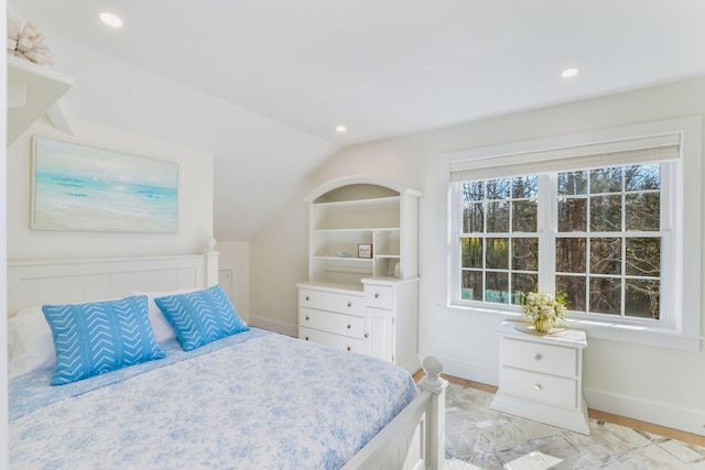 bedroom featuring baseboards, vaulted ceiling, and recessed lighting