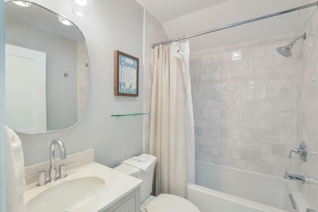 bathroom with vanity, toilet, and shower / tub combo