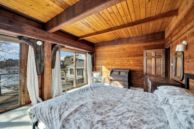 bedroom featuring wooden ceiling, beam ceiling, carpet floors, wood walls, and access to outside