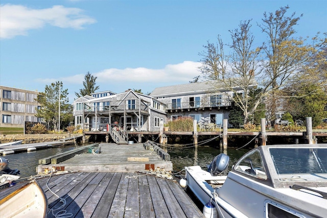 dock area with a water view