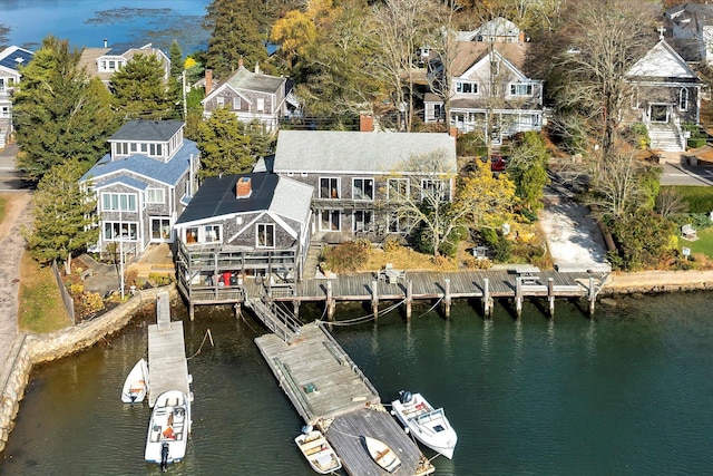 bird's eye view with a water view and a residential view