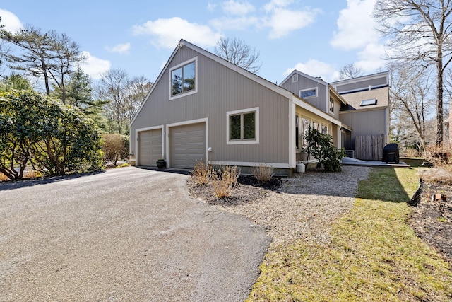 39 Fox Run Ln, East Falmouth, MA 02536 - view of side of property with a garage