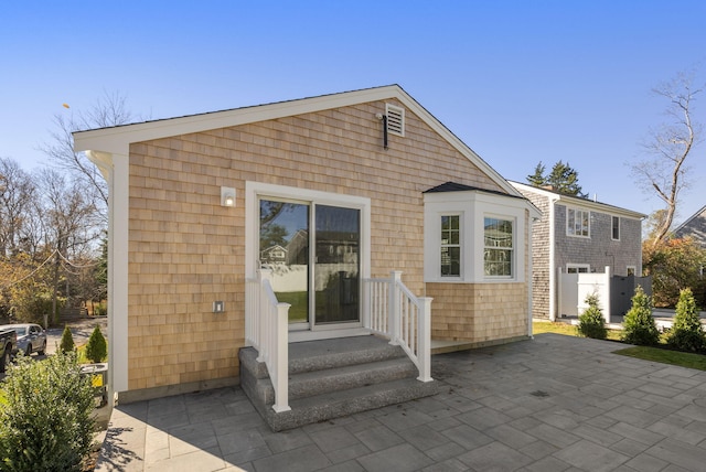 rear view of property with a patio area