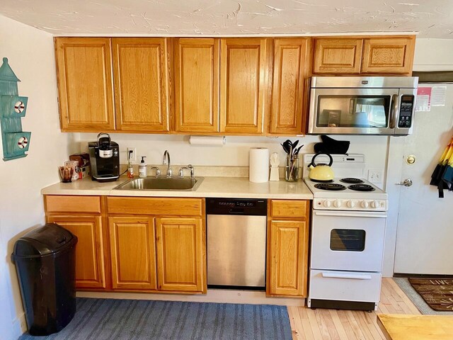 kitchen with sink and stainless steel appliances