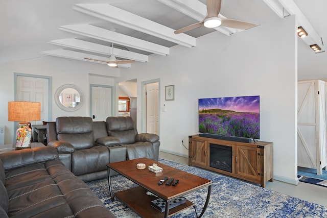 living room featuring ceiling fan and vaulted ceiling with beams