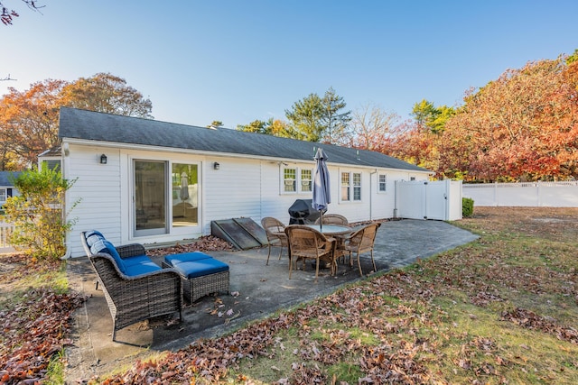 rear view of property with a patio area