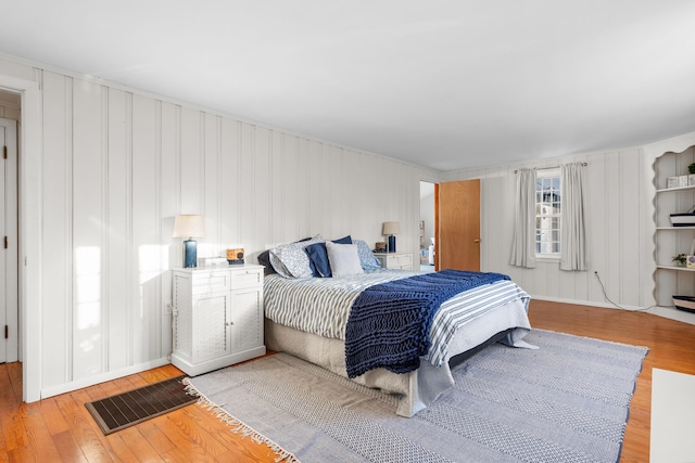 bedroom with light hardwood / wood-style floors