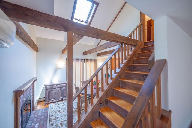 12 Tree Top Ln, East Falmouth, MA 02536 - stairs featuring beam ceiling, a fireplace, and high vaulted ceiling