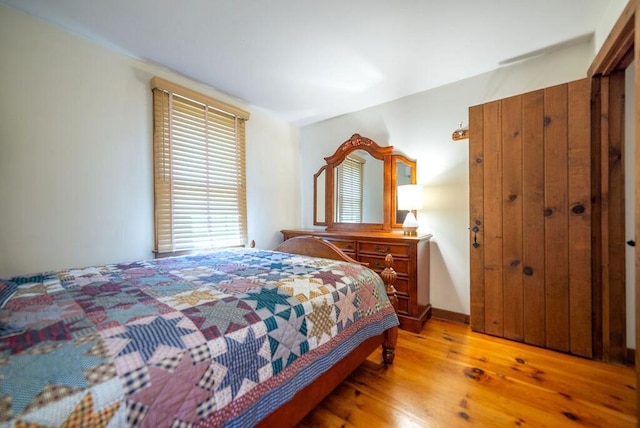 12 Tree Top Ln, East Falmouth, MA 02536 - bedroom with light wood-style floors