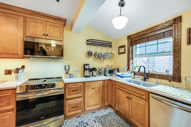 kitchen featuring pendant lighting, appliances with stainless steel finishes, vaulted ceiling with beams, sink, and light tile patterned flooring