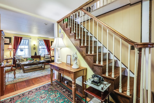 stairway with wood-type flooring