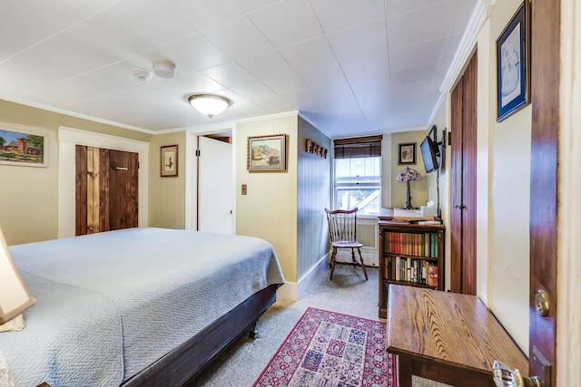 bedroom featuring crown molding