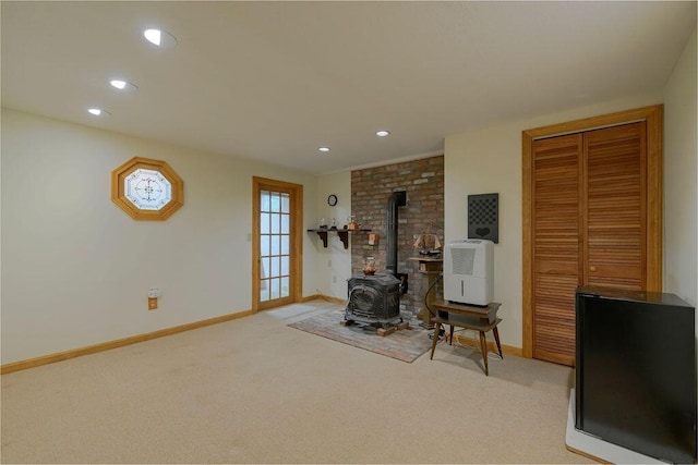 31 Woodridge Rd, East Sandwich, MA 02537 - carpeted living room featuring a wood stove, baseboards, and recessed lighting