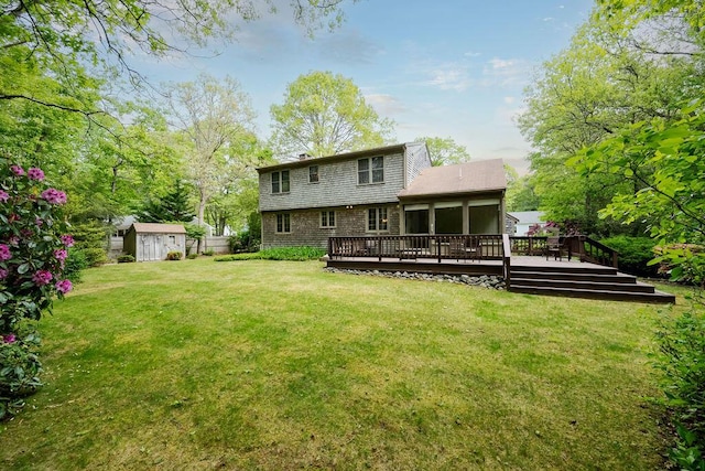 31 Woodridge Rd, East Sandwich, MA 02537 - back of property featuring a wooden deck, a lawn, and a chimney
