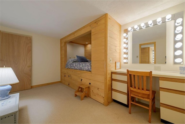 31 Woodridge Rd, East Sandwich, MA 02537 - bedroom featuring light colored carpet, an office area, and wooden walls
