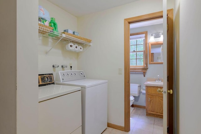 31 Woodridge Rd, East Sandwich, MA 02537 - washroom with independent washer and dryer, light tile patterned flooring, and baseboards