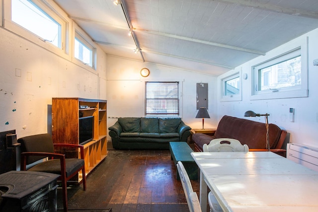 living room with dark wood-type flooring, rail lighting, electric panel, and vaulted ceiling with beams