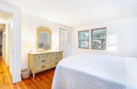 bedroom featuring hardwood / wood-style flooring and a closet