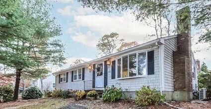 view of front of house with central AC unit