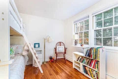 living area with wood-type flooring