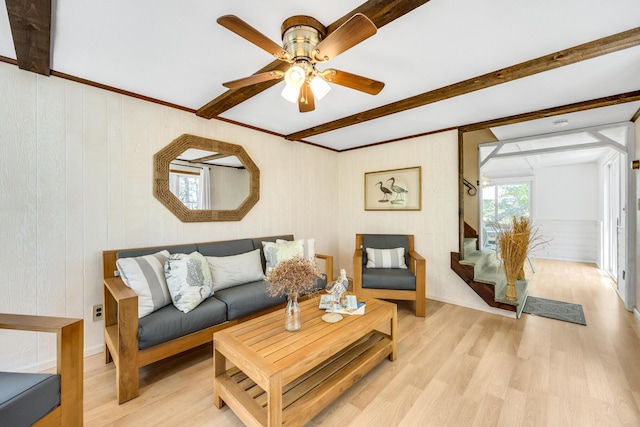 190 Meadow Ave W, Wellfleet, MA 02667 - living area with beamed ceiling, stairway, light wood-type flooring, and a ceiling fan