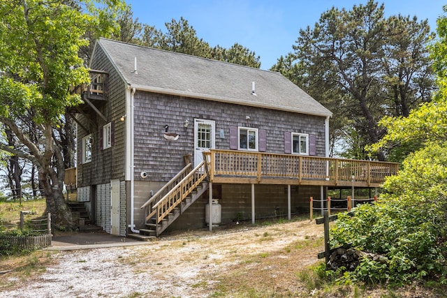 190 Meadow Ave W, Wellfleet, MA 02667 - rear view of house with stairway, a deck, and a shingled roof