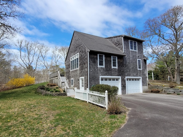 393 Thousand Oaks Dr, Brewster, MA 02631 - view of side of property with stairs, driveway, a garage, and roof with shingles
