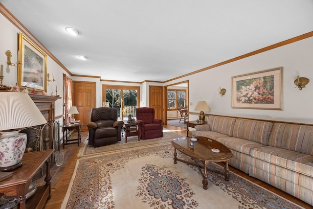 living room with hardwood / wood-style flooring and crown molding