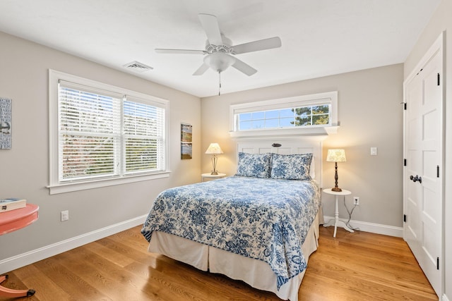 31 Seatucket Rd, East Falmouth, MA 02536 - bedroom with ceiling fan, visible vents, light wood-type flooring, baseboards, and a closet