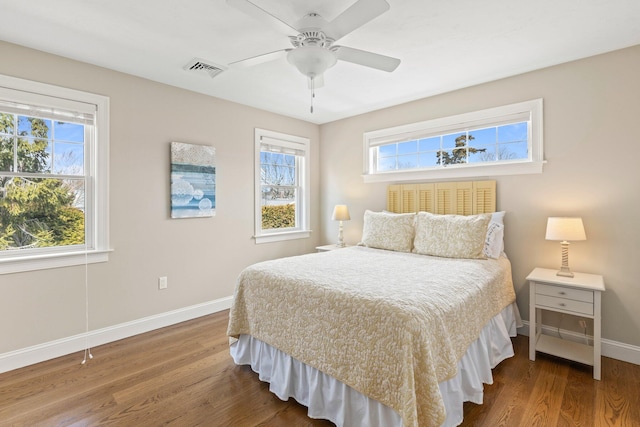 31 Seatucket Rd, East Falmouth, MA 02536 - bedroom featuring baseboards, visible vents, and wood finished floors
