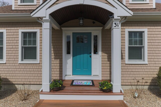 31 Seatucket Rd, East Falmouth, MA 02536 - doorway to property featuring a shingled roof