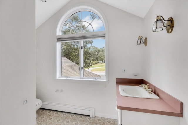 bathroom featuring baseboards, lofted ceiling, toilet, baseboard heating, and vanity