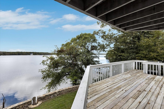 wooden terrace with a water view