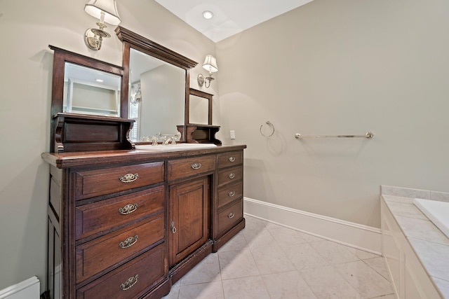 bathroom with tile patterned floors and vanity