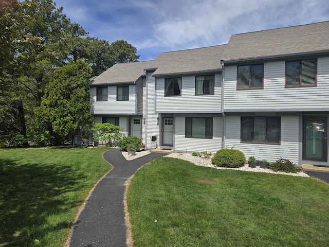 107 Court Way, Brewster, MA 02631 - view of property featuring a front lawn and a shingled roof
