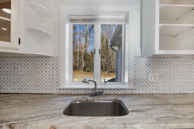 kitchen with sink and backsplash