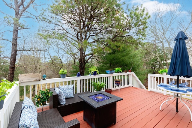 415 Raymond Rd, Plymouth, MA 02360 - deck featuring a fire pit