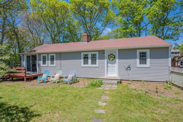 75 Swan Lake Rd, West Yarmouth, MA 02673 - view of front of property with a chimney, a deck, and roof with shingles