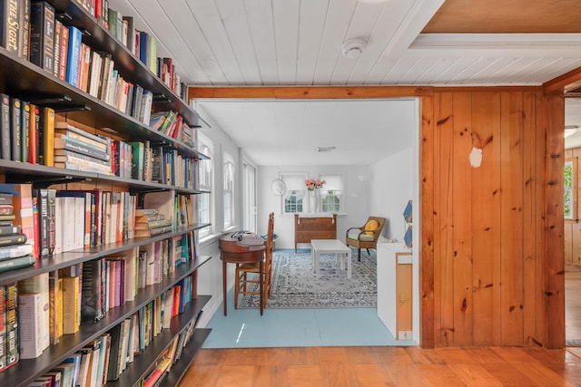 75 Swan Lake Rd, West Yarmouth, MA 02673 - hallway featuring healthy amount of natural light, wooden walls, and wooden ceiling