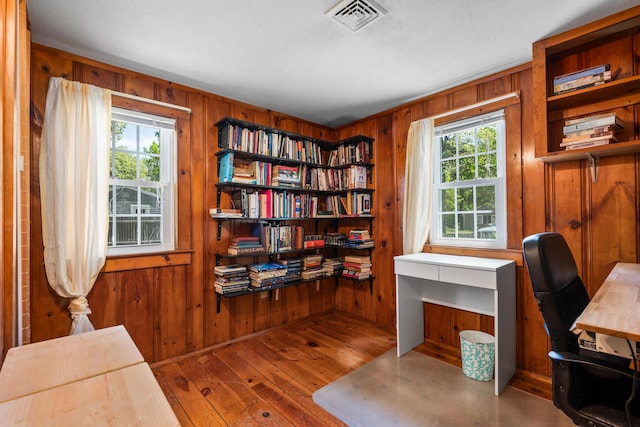 75 Swan Lake Rd, West Yarmouth, MA 02673 - office space with wooden walls and hardwood / wood-style flooring