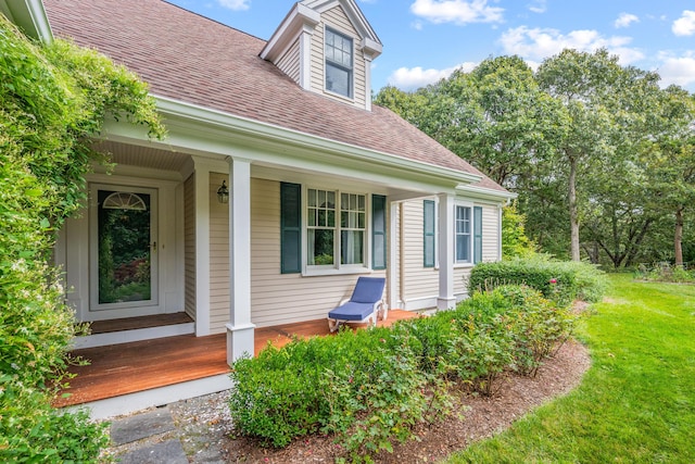 property entrance featuring a porch