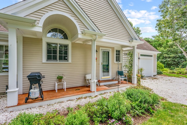 doorway to property featuring a garage