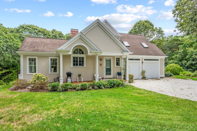 view of front facade with a garage and a front lawn