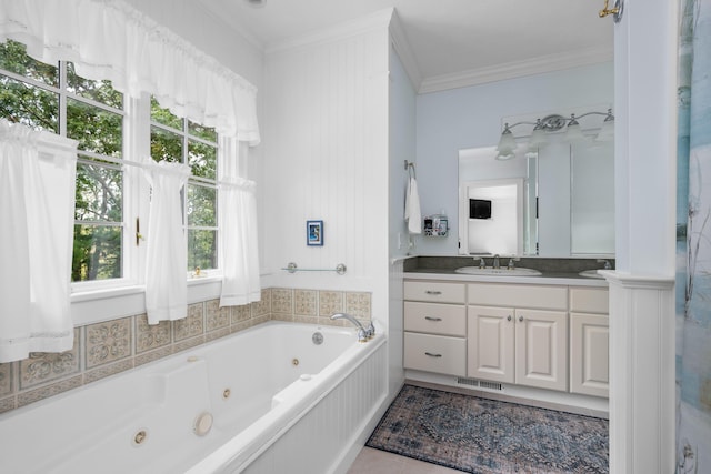 bathroom with vanity, a tub, ornamental molding, and tile patterned flooring