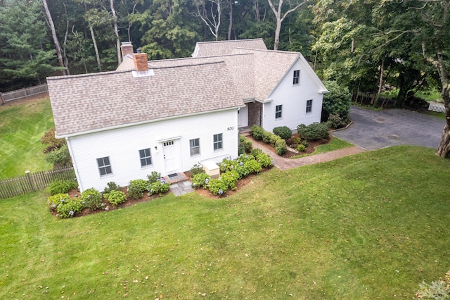 exterior space featuring a front yard